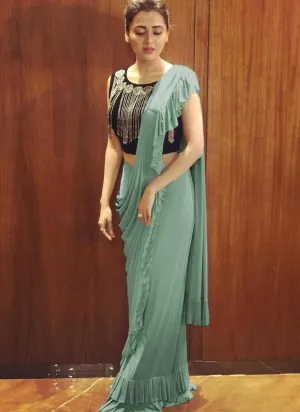 Adorable Teal Green Georgette Base Party Wear Ruffled Saree