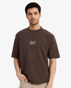 Rare Rabbit Men Reborn-T Brown Cotton Fabric Short Sleeve Crew Neck Oversized Fit Graphic Print T-Shirt
