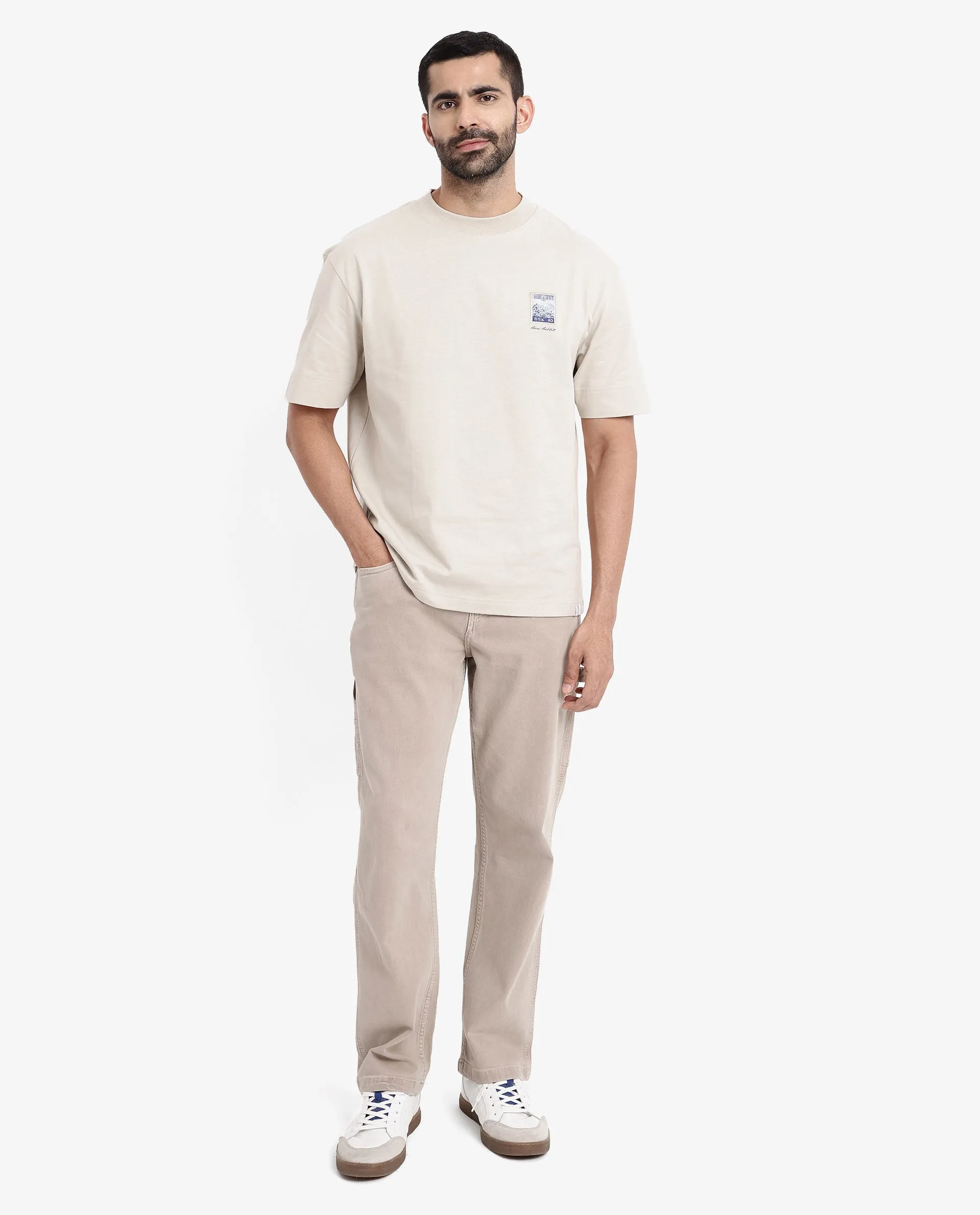Rare Rabbit Men Trams Beige Cotton Fabric Short Sleeve Crew Neck Oversized Fit Graphic Print T-Shirt